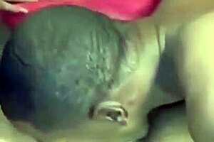 Ebony goddess blows fangs over her submissive partner
