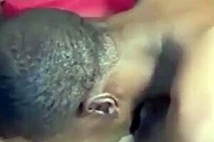 Ebony goddess blows fangs over her submissive partner