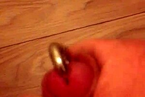 Performing handjob with a pierced cock results to an epic cumshot