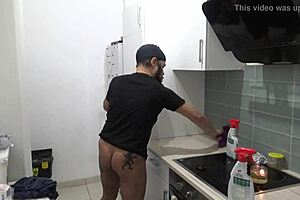 Nude men cleaning the house