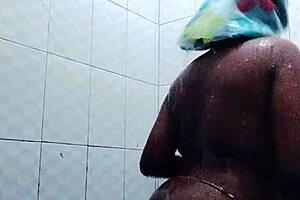 In her own home Becky enjoys a steamy shower as black beauty Becky