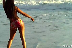 Asian slut shakes her huge boobs and ass in public