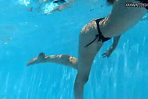 Small tits European teen having fun in the water and getting kinky