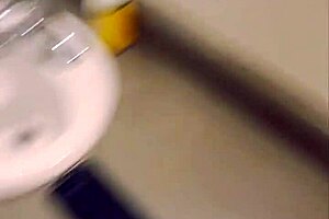 Tiny titted blonde gets sucked by big black cock in bathroom