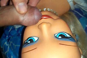 Big cock Barbie dollman put the meat through an incredible blowjob while wearing a pink dress
