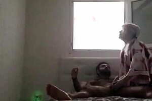 Milf has sex with another man in a hotel room with her husband present