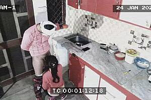 Captured amateur couple in their heat in the kitchen