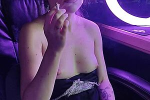 There’s a stunning woman, who smokes a cigarette