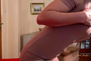 A petite cougar with small tits from a POV video