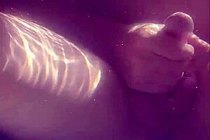 Waterproof gay boy masturbates to orgasm