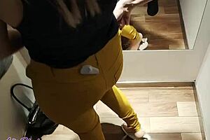 This latex clad amateur girl gets cream pie in the fitting room