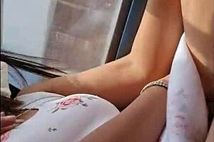 A Colombian girl in miniskirt on a bus