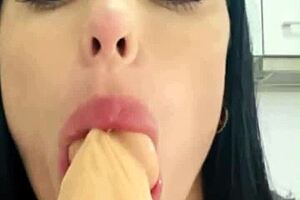 Trimmed beauty pleasures herself with large objects and obscene words