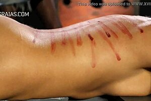 BDSM video teaches Domina on how to punish her slave through applying whip on his or her body
