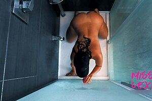 Mature woman masturbating in the bathroom shower pleasing herself