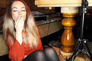 Asian wife enjoys a cigarette