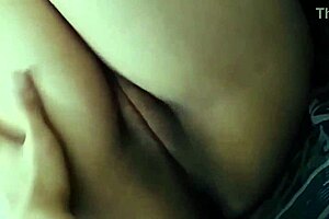 Mom and son have sex on the bed in a homemade video