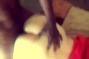 Two latino women, one of them wearing a big black cock Mask while sucking and fucking