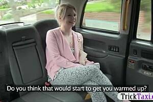 There’s a stunning blonde in the backseat of the car, who’s enjoying a wild ride