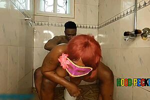 Ebony beauty surprises the bathroom with a steamy surprise