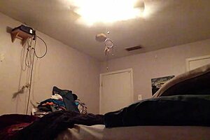 A couple in Mobile, Alabama with their cameras recording have sex in the doggy style position