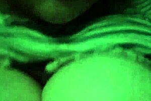 The family room, amateur girl fondling her large breasts