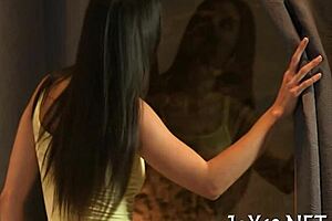 18-year-old naked girl overcomes herself and uses a dildo