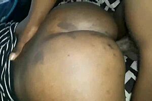 The small black woman secretly pleasures herself before her friend comes back