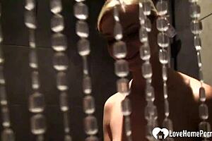 C4 – Iconic blonde beauty in shower splashing and washing her body