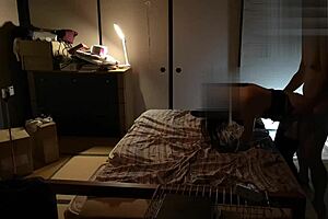 A Japanese man pleasure himself in different positions while wearing stockings