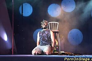 Extreme BDSM and fetish presentation that transmits a live performance to the viewers