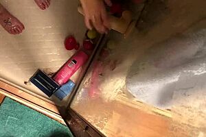 Horny wife uses dildo in the bath room for self pleasure