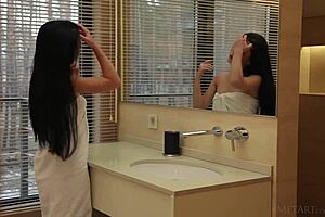 Tiny, natural-tressed Amelie B in a masturbation scene illustrated in the shower
