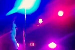 ning video footage of a stripper dancing in the knee high boots that she was wearing has her clothes torn off