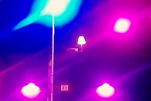 ning video footage of a stripper dancing in the knee high boots that she was wearing has her clothes torn off