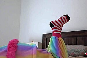 Strip tease Asian solo performer is able to tear clothes and socks
