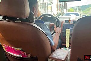 Public humiliation: A teenager girl gives a risky blowjob in a car and the taxi driver films her