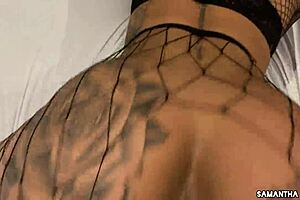 Bouncing on the booty: A tatted MILF's anal escapade