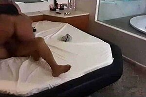 Husband and wife, either porn novice or beginner, engage in some wrong etiquette in a private hotel bedroom