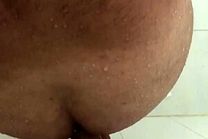 Shower play is anal between two gay guys with toys