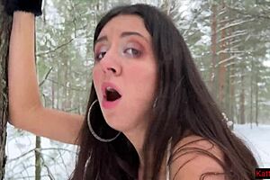 Winter forest public BDSM with a youth pair