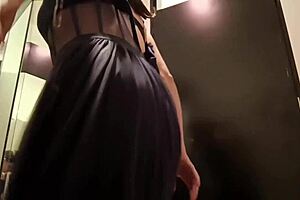 A beautiful woman gets excited in her car and again, in a changing room