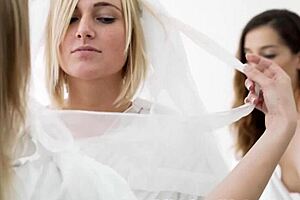 Three lesbians stimulate a stunning attractive Mormon woman with a dildo in a threesome