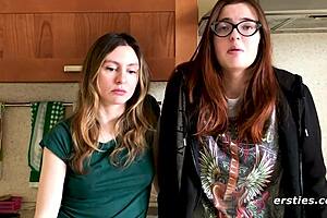 Caucasian women, a Ukrainian couple, Felicia and Lina, twist their bums making them rub against each other