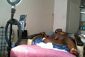 A beautiful African American mature woman reaches the type of self-pleasure