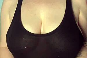 Australian model shows off her big tattoos and slapping her huge breasts