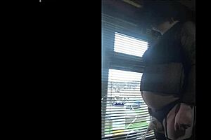 Public milking by the window is enjoyed by bisexual crossdresser