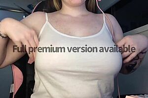 Tease of an attractive lady wearing a tight fitting white top