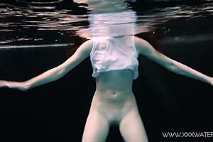 Compulsive voyeurism: anonymous Russian teenager Andrejka using a smartphone naked in an outdoor swimming pool