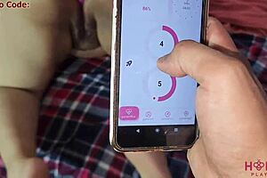 This man uses his phone to pleasure a chubby amateur woman via a honeycomb vibrator in her ass